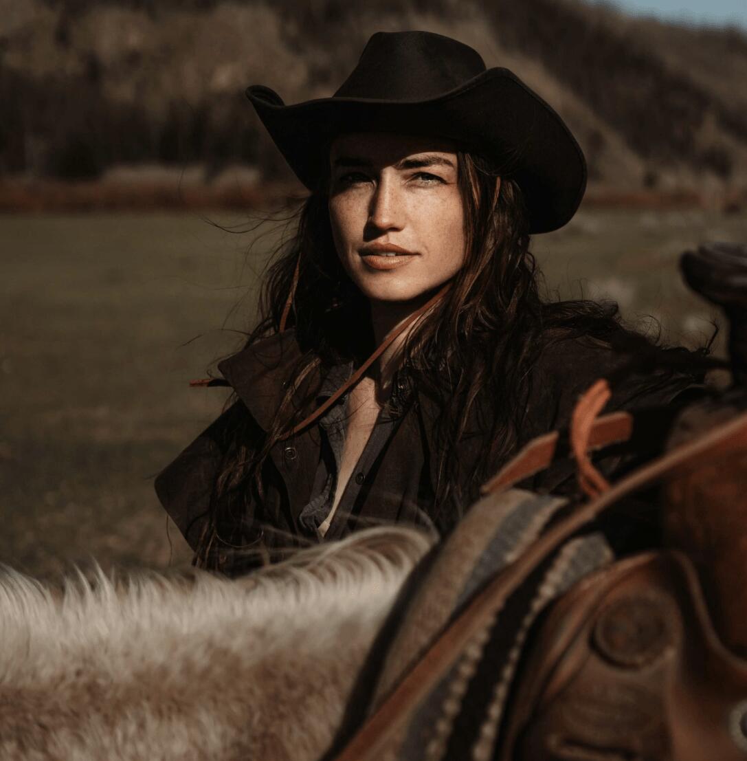 Cowgirl wearing a hat.